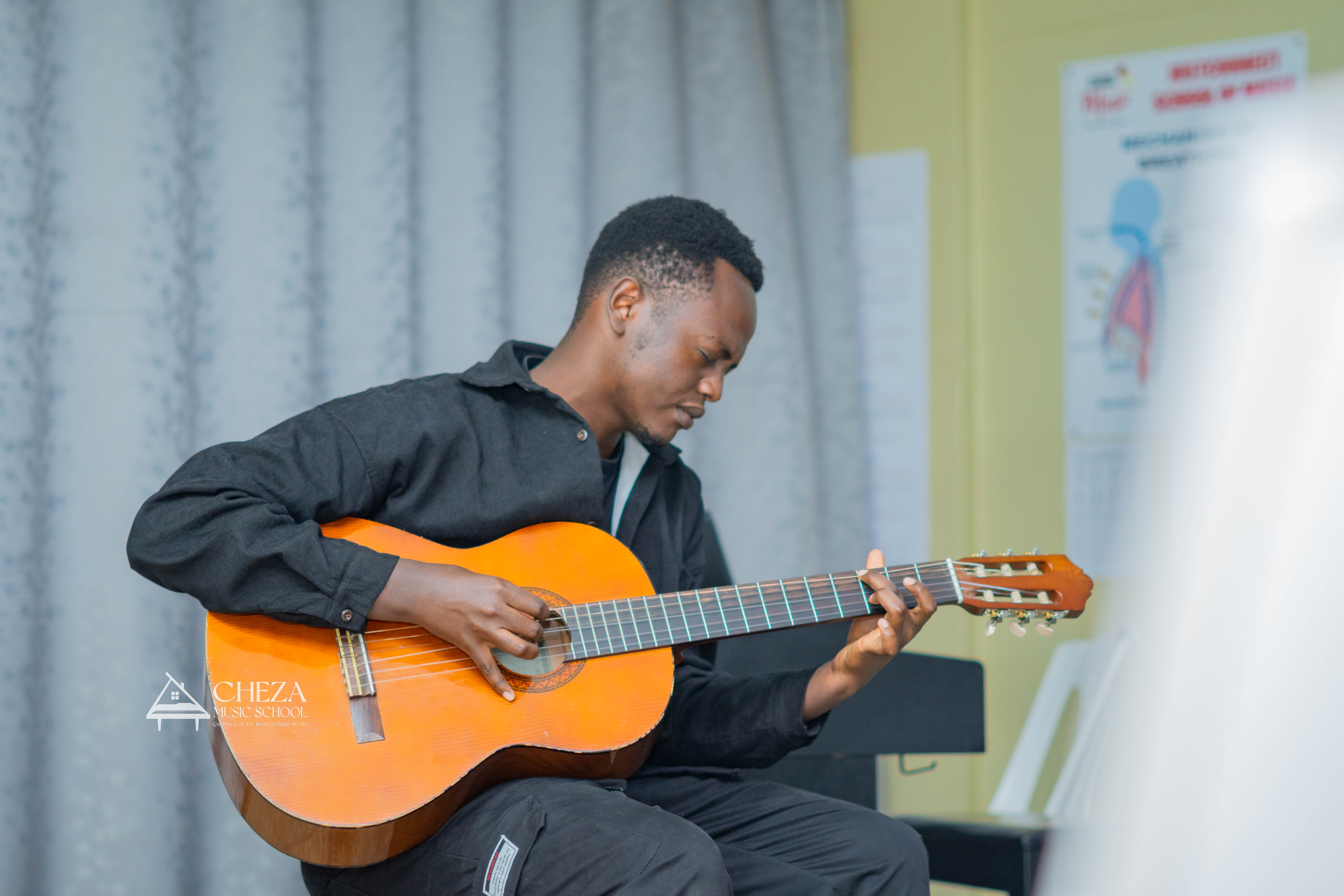 Home Guitar Teacher Cheza Music School